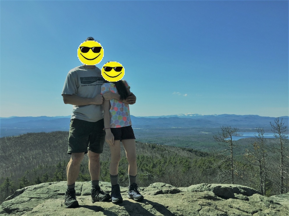 Dad and daughter atop Pleasant Mountain summit